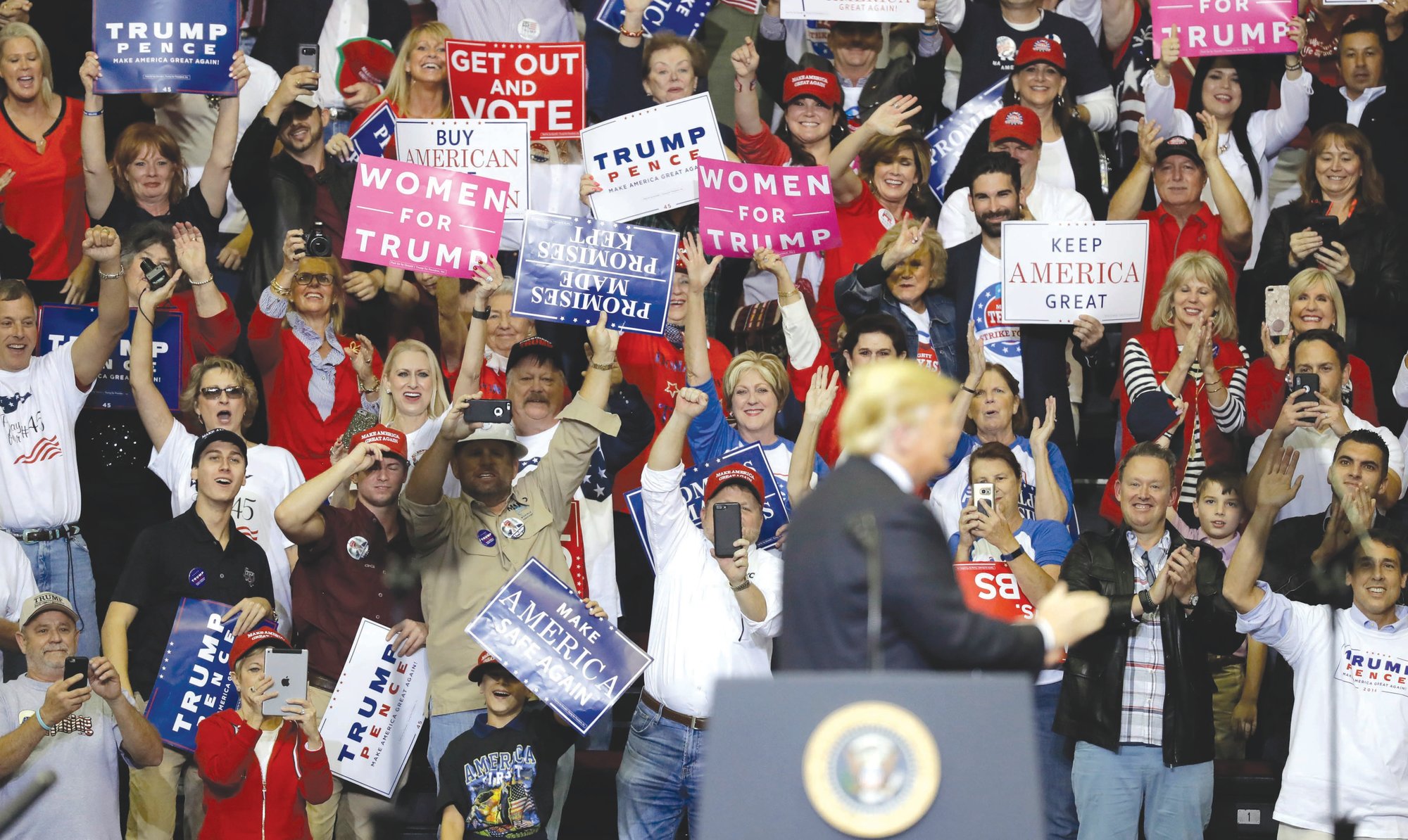 Supporters cheer for President Donald Trump during a campaign rally Monday in Houston.