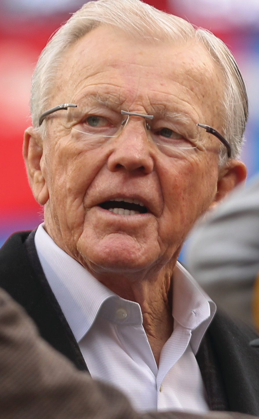 Former Washington Redskins head coach Joe Gibbs walks along the sidelines before the NFL football game between the Washington Redskins and the Philadelphia Eagles, Sunday, Dec. 30, 2018 in Landover, Md. (AP Photo/Andrew Harnik)