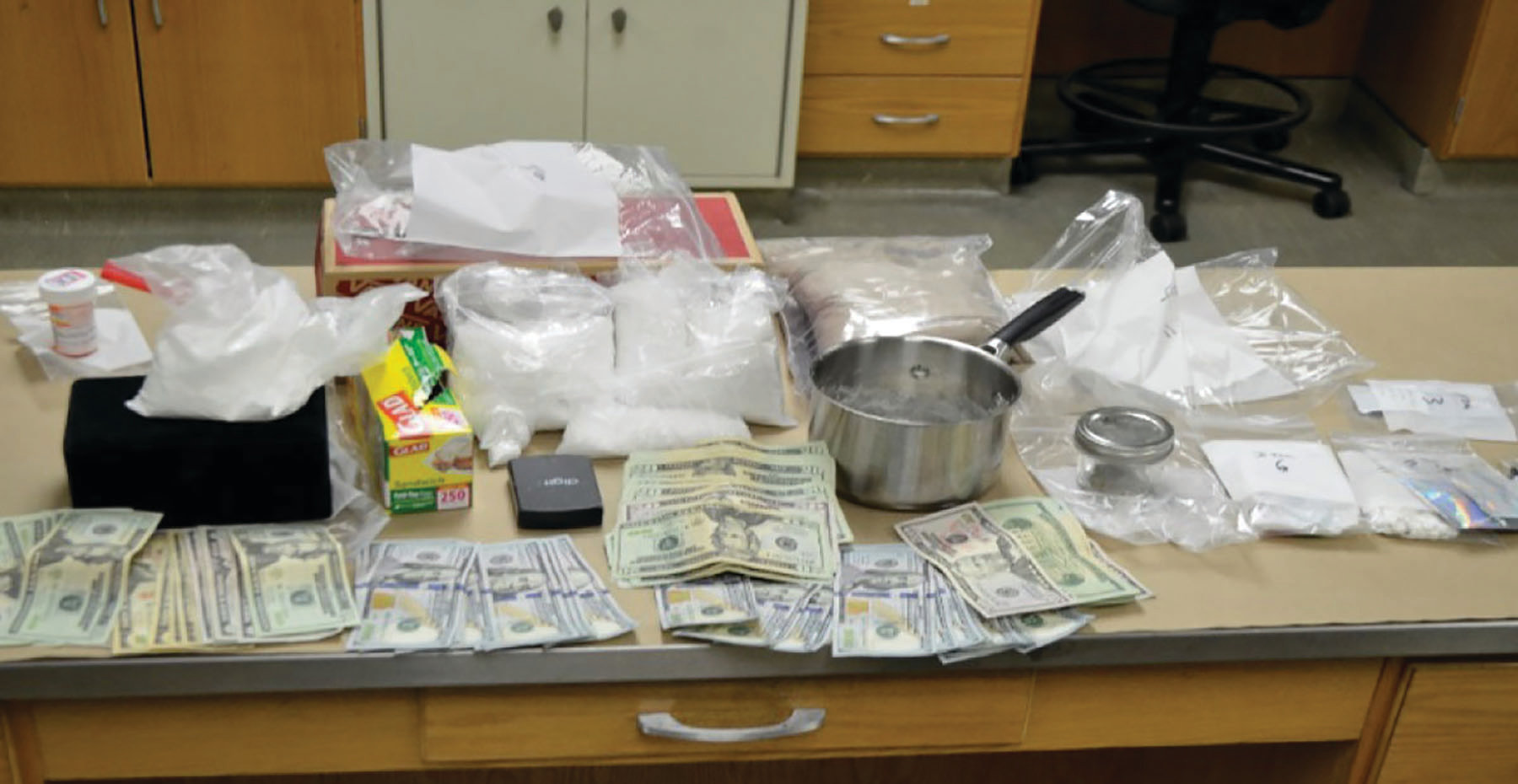 PHOTO PROVIDEDWhen executing the search warrant at Calvin's home, agents seized approximately one kilogram of methamphetamine, approximately 200 grams of cocaine, a small amount of marijuana, other controlled substances and $3,908 in cash.
