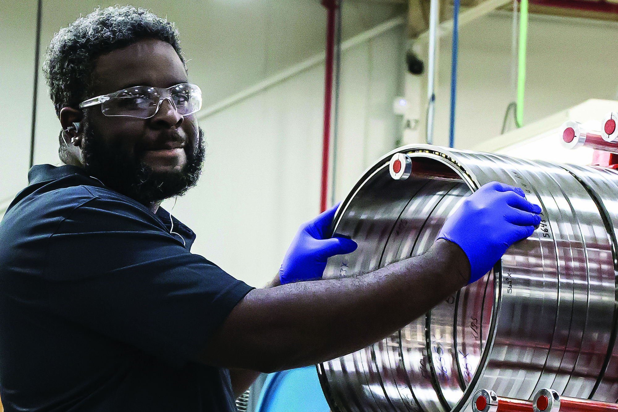 An SKF Sumter manufacturing employee works at the bearing plant in Live Oak Industrial Park recently.