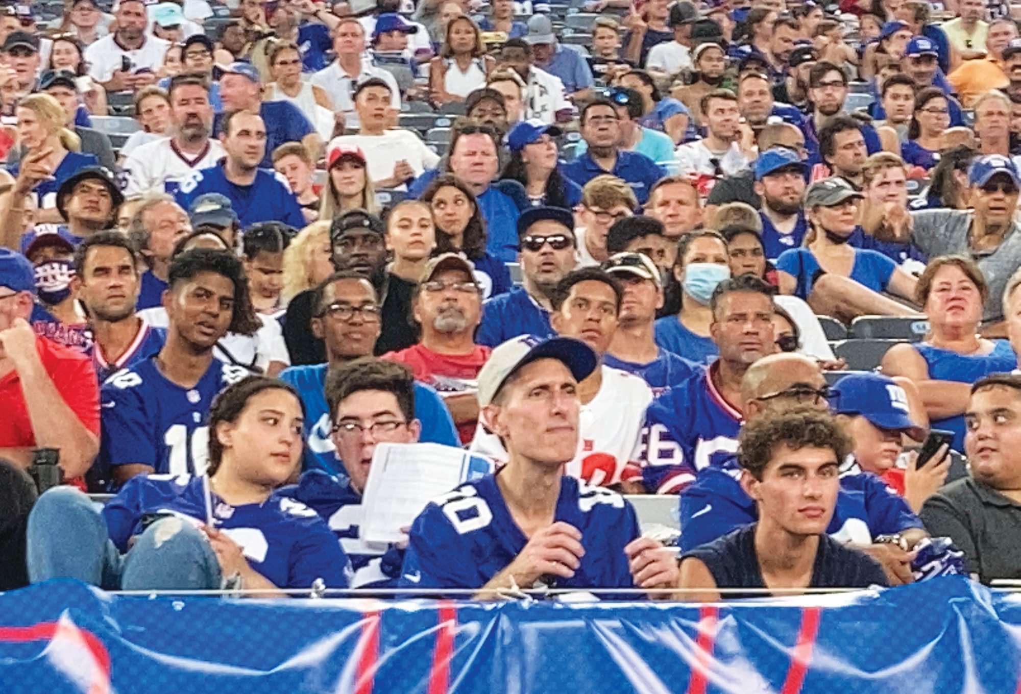 Fans attend the New York Giants' NFL football practice at MetLife Stadium on Wednesday in East Rutherford, New Jersey.