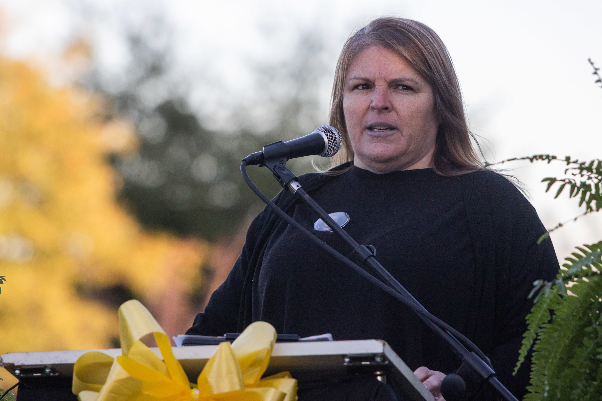 Angel Brown speaks at the podium during the Sumter's Missing memorial service on Nov. 13, 2022.
