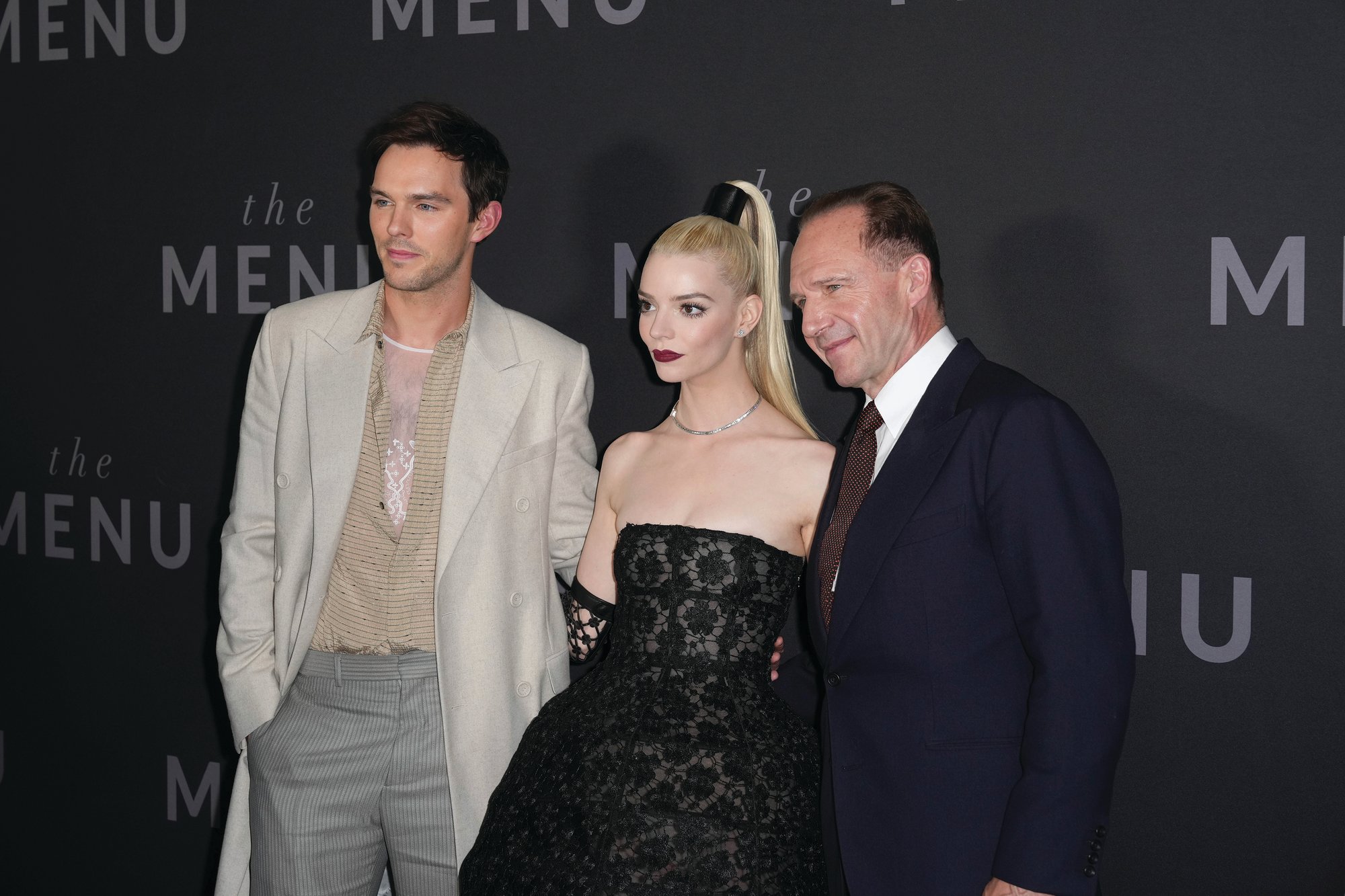 From left, Nicholas Hoult, Anya Taylor-Joy and Ralph Fiennes attend the New York premiere of "The Menu" at AMC Lincoln Square Theater on Nov. 14 in New York City.