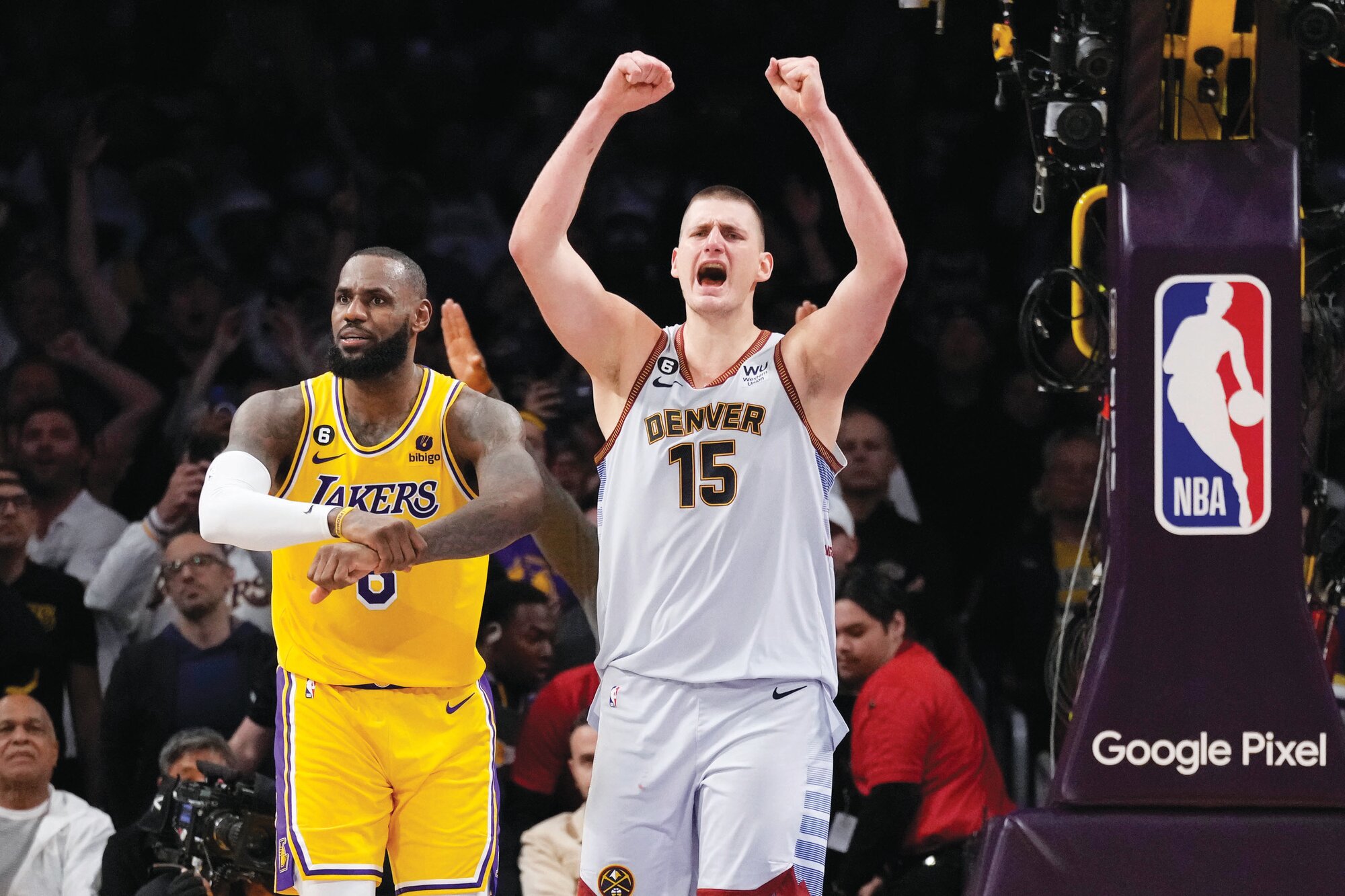 Denver Nuggets center Nikola Jokic (15) celebrates after beating the Los Angeles Lakers in Game 4 of the Western Conference Finals on Monday in Los Angeles.