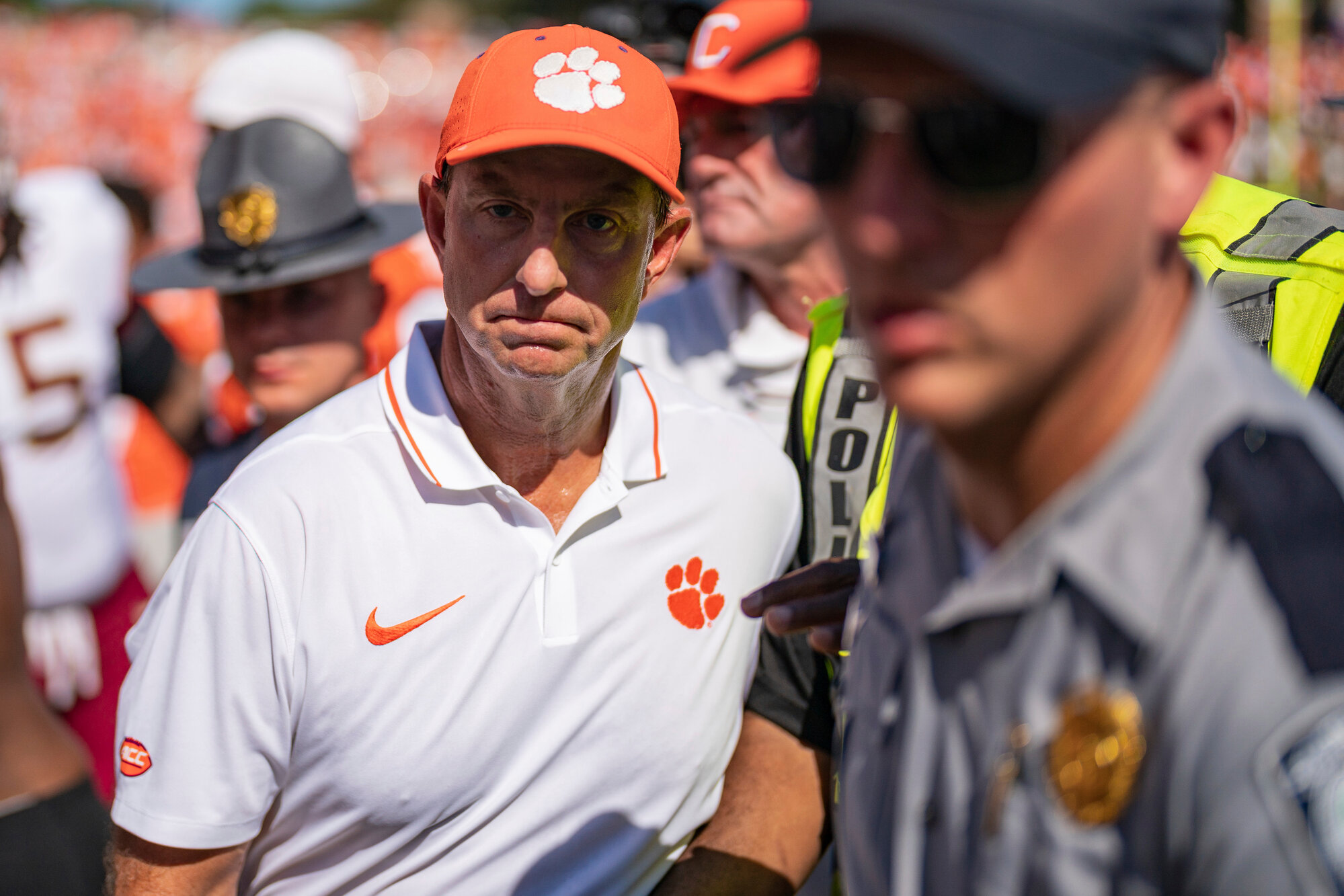 Clemson head coach Dabo Swinney walks off the field after losing to Florida State in overtime on Saturday in Clemson.