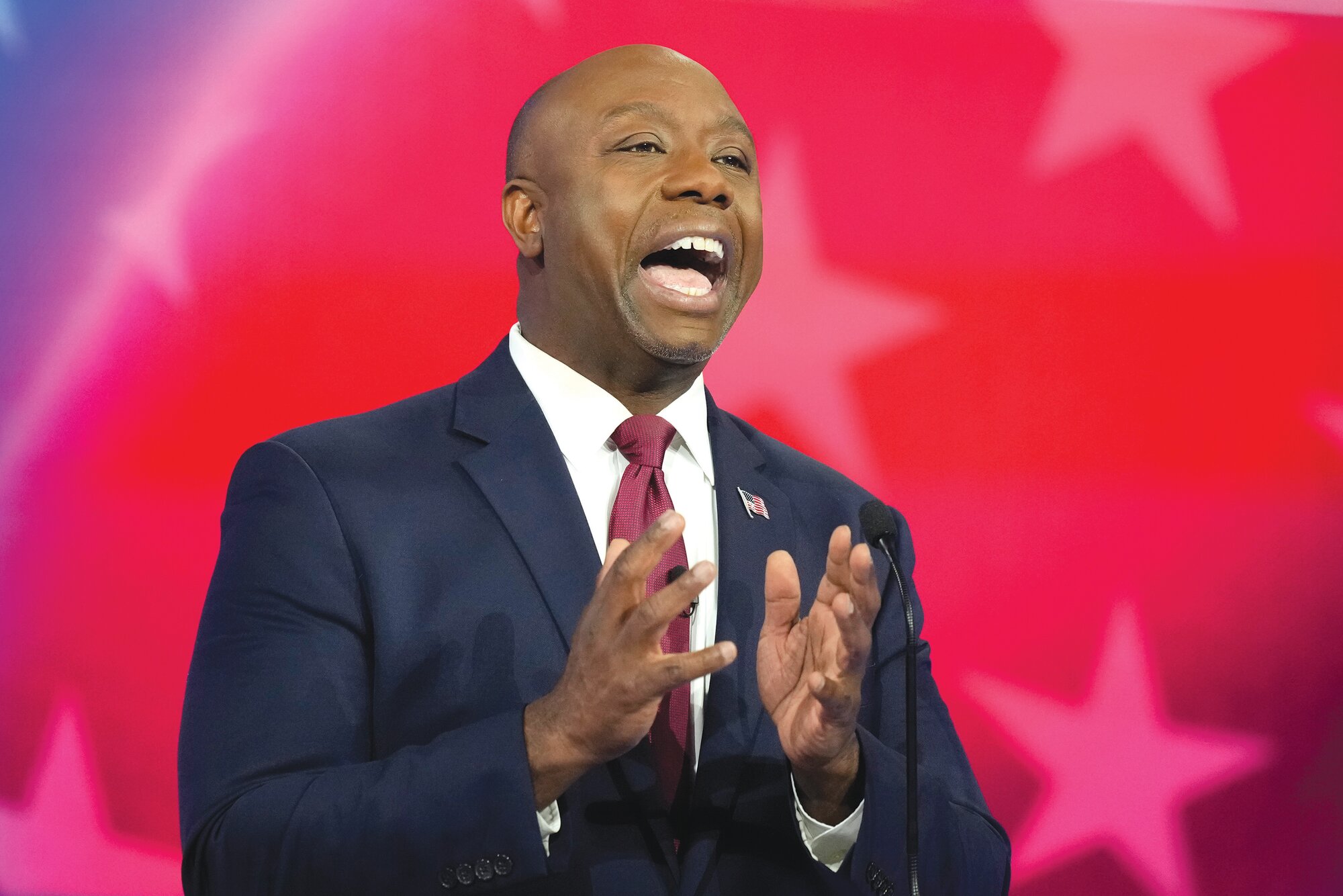 Republican presidential candidate Sen. Tim Scott, R-S.C., speaks during a Republican presidential primary debate hosted by NBC News on Nov. 8 at the Adrienne Arsht Center for the Performing Arts of Miami-Dade County in Miami. Scott said Sunday he is ending his campaign for the GOP presidential nomination.