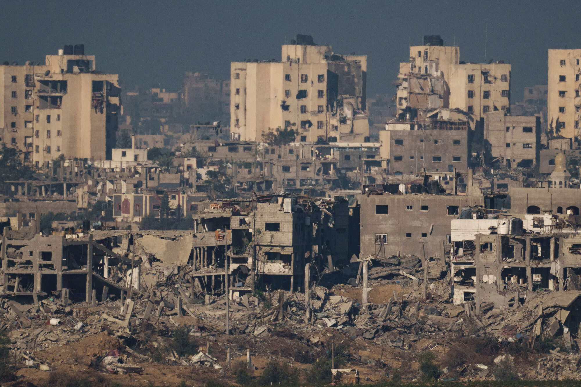 Destroyed buildings stand in the Gaza Strip, as seen from southern Israel, Thursday, Nov. 16, 2023.