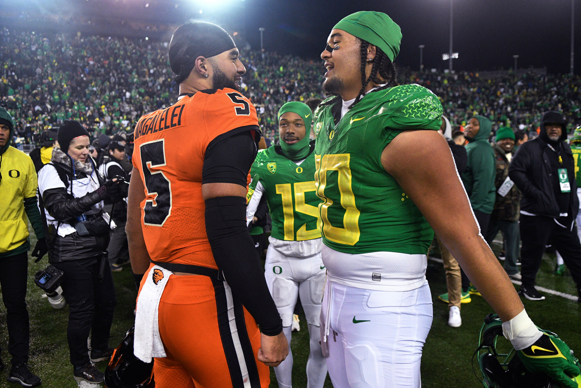 Former Clemson quarterback and current Oregon State signal-caller DJ Uiagalelei, left, is headed to his third school after entering the transfer portal on Thursday.