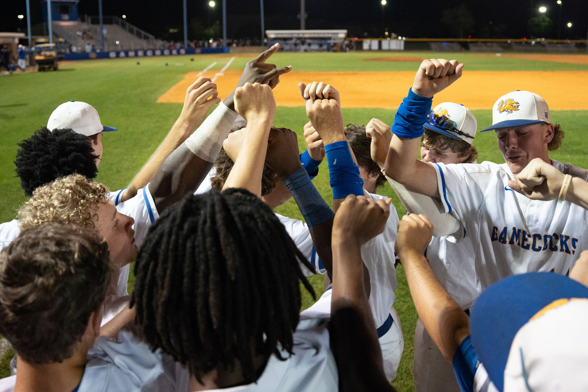 The Sumter High baseball team breaks down their huddle after their loss to River Bluff on Thursday, May 2.