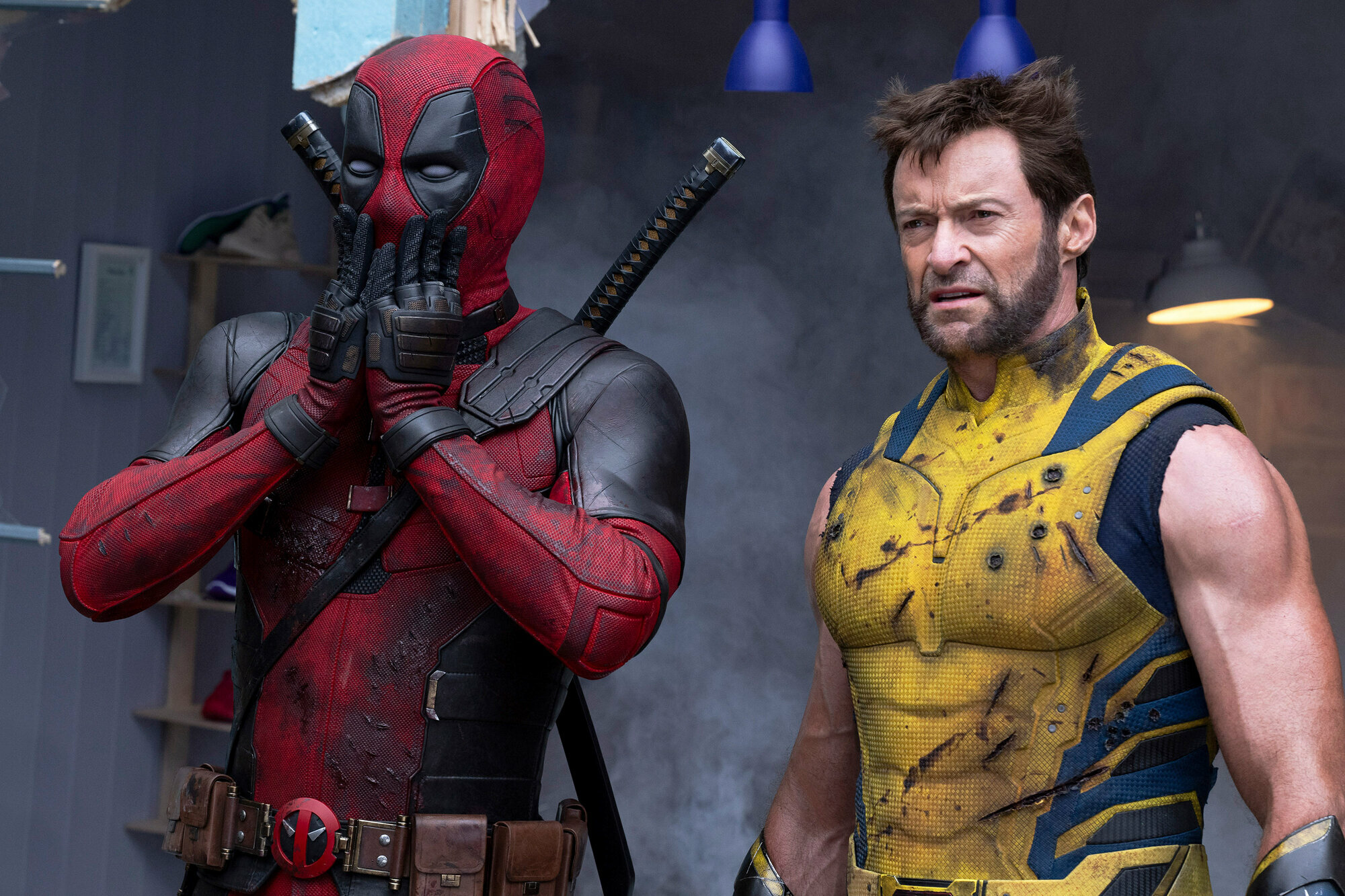 This image released by 20th Century Studios/Marvel Studios shows Ryan Reynolds as Deadpool/Wade Wilson, left, and Hugh Jackman as Wolverine/Logan in a scene from "Deadpool & Wolverine."