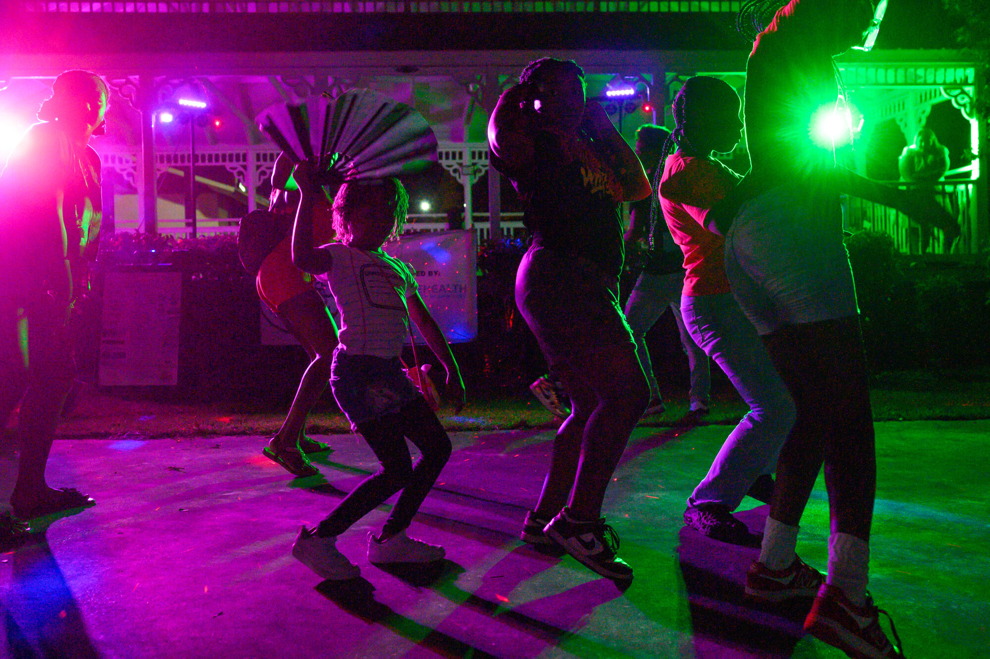 Delilah Amos, 6, left, line dances to music.